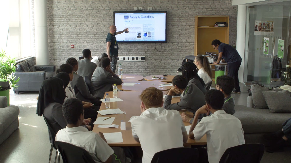 James West giving a school presentation